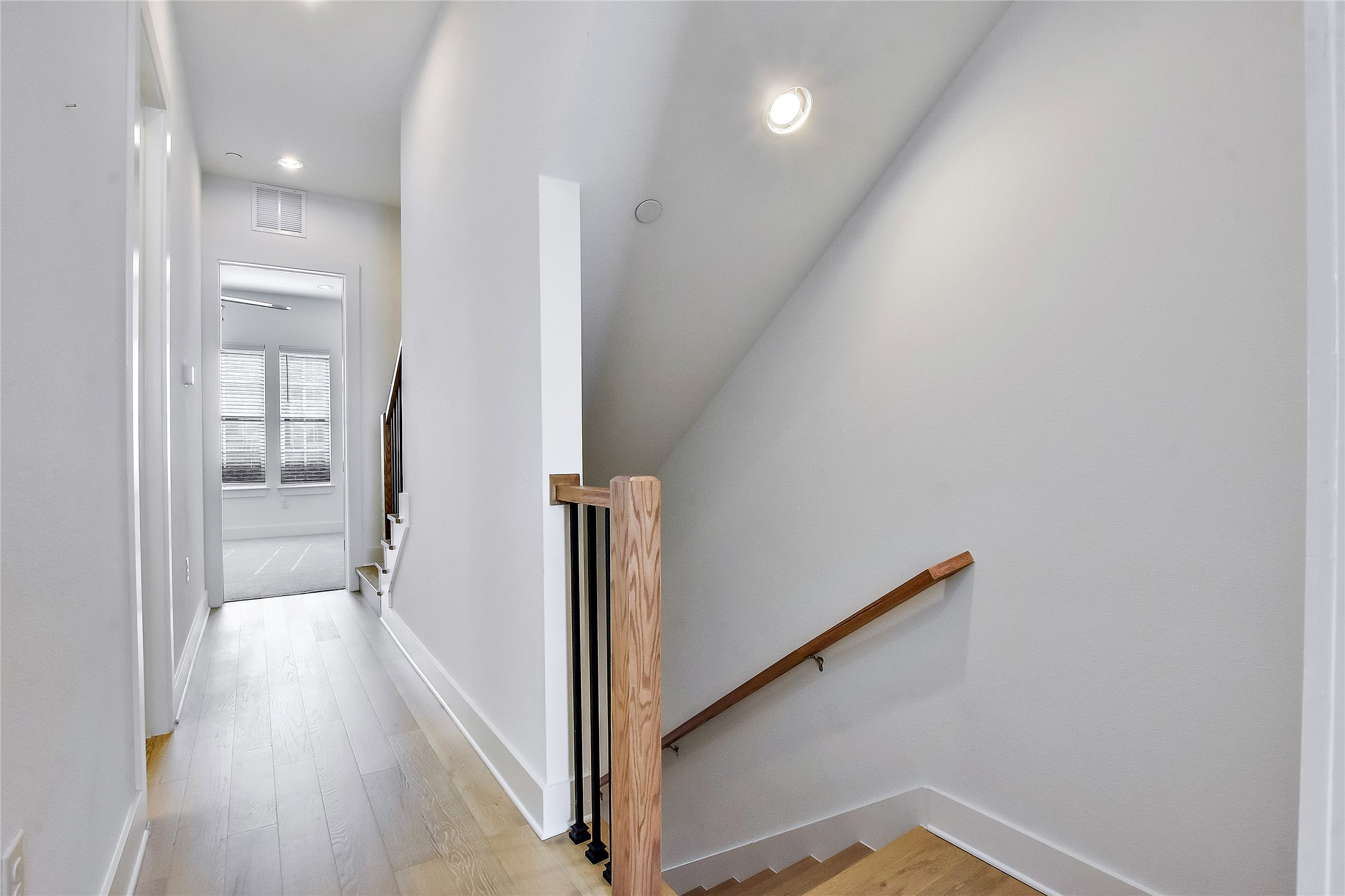 1308 Tinnin Ford Road, Unit 3 Austin, TX 78741 - Photo 14 of 37 3rd Floor Hallway. 2 bedrooms with en-suite bathrooms are on this level