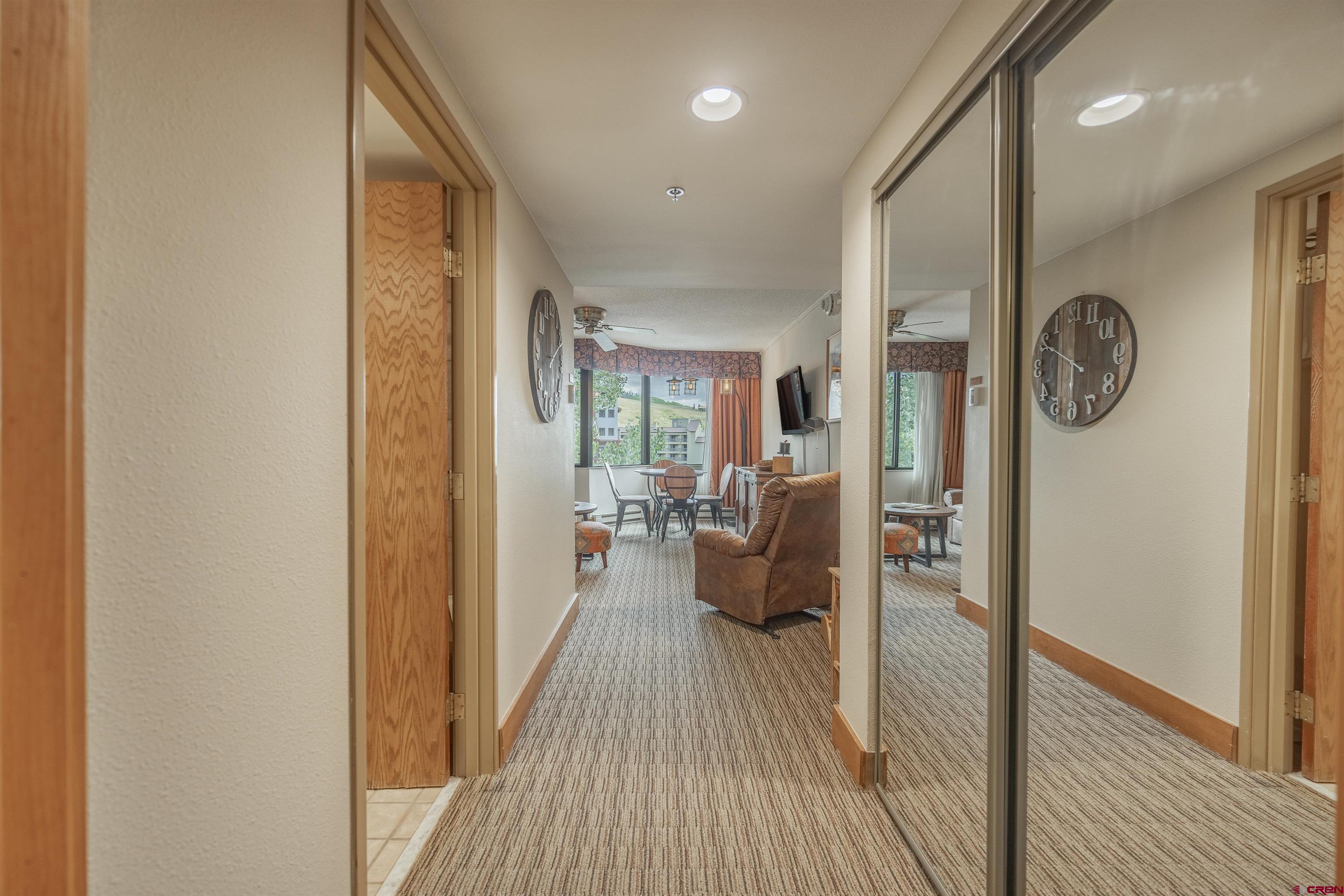 6 Emmons Road, Unit 553 Crested Butte, CO 81225 - Photo 13 of 27 a view of a hallway with a couch