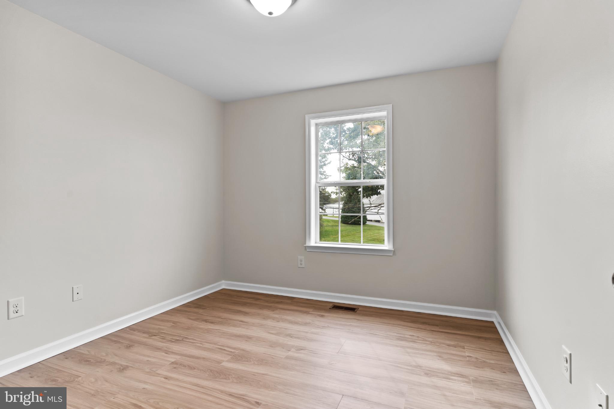 99 Middle Spring Road Shippensburg, PA 17257 - Photo 22 of 27 an empty room with a window