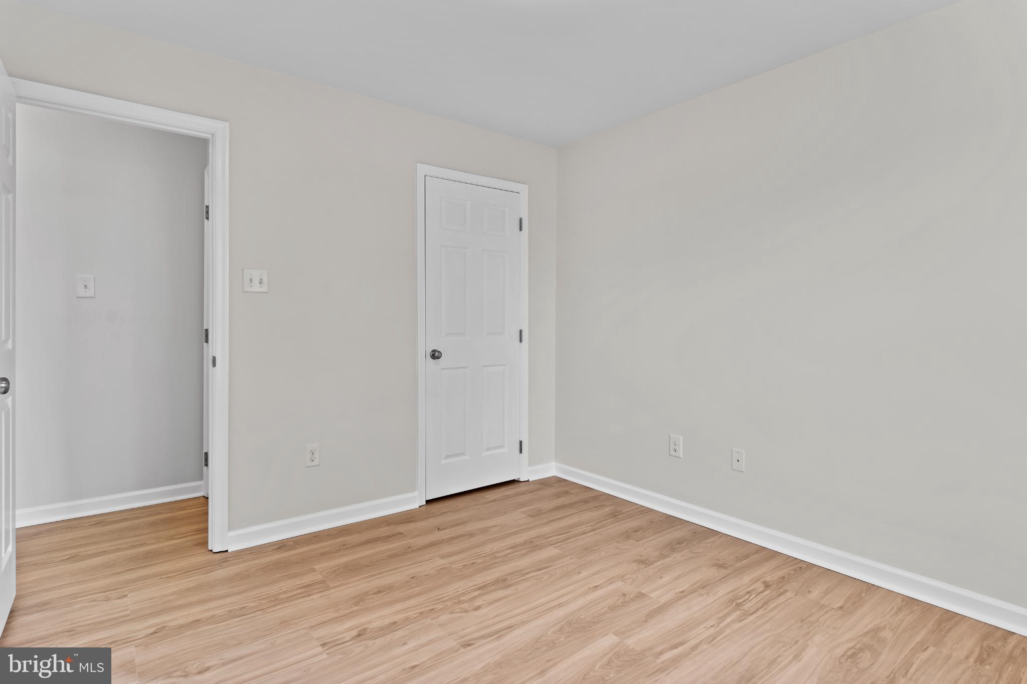 99 Middle Spring Road Shippensburg, PA 17257 - Photo 23 of 27 a view of an empty room with wooden floor