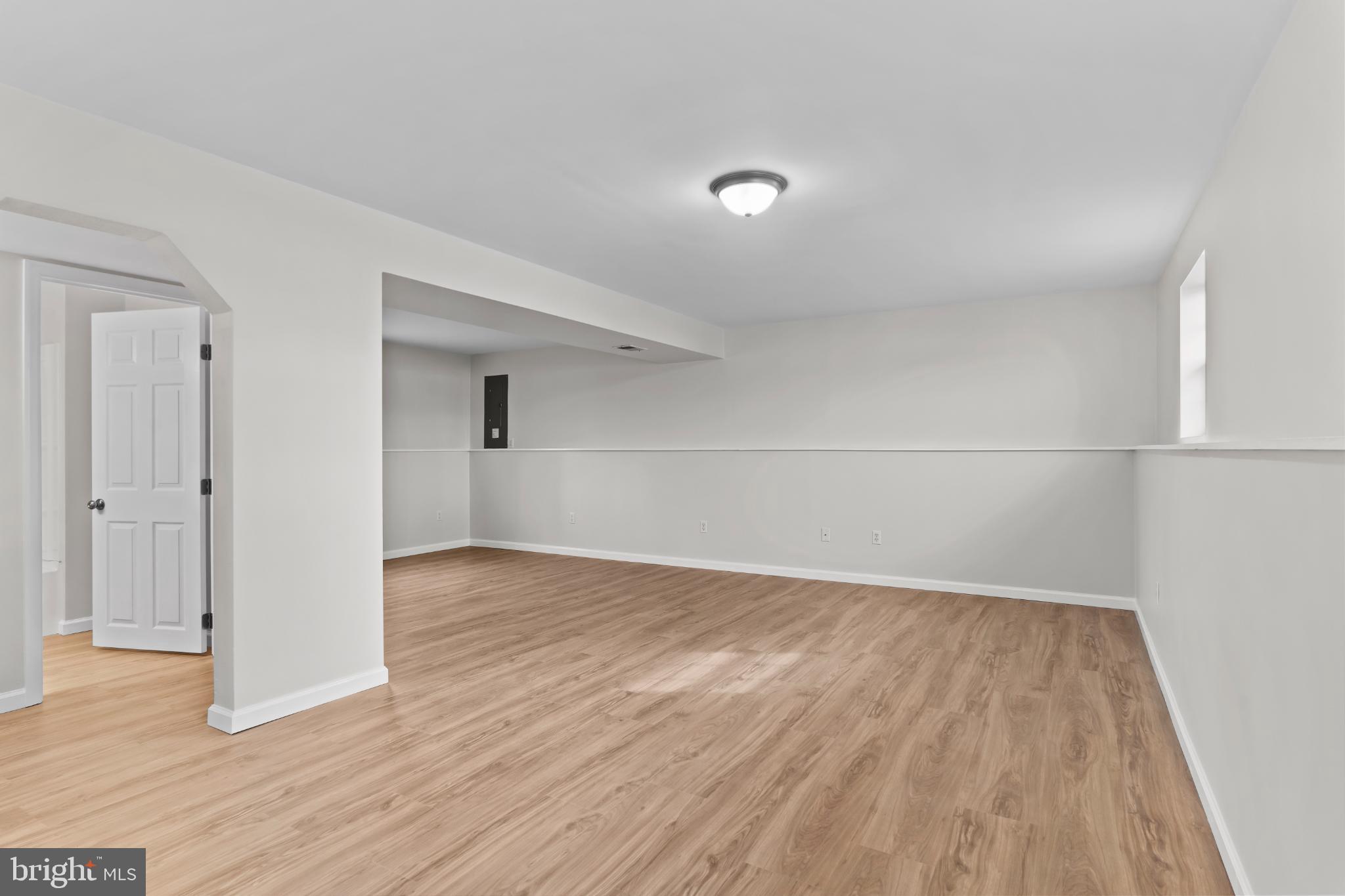 99 Middle Spring Road Shippensburg, PA 17257 - Photo 27 of 27 a view of an empty room with wooden floor