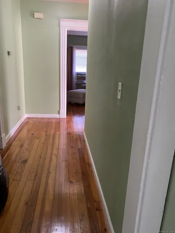 a view of livingroom with wooden floor
