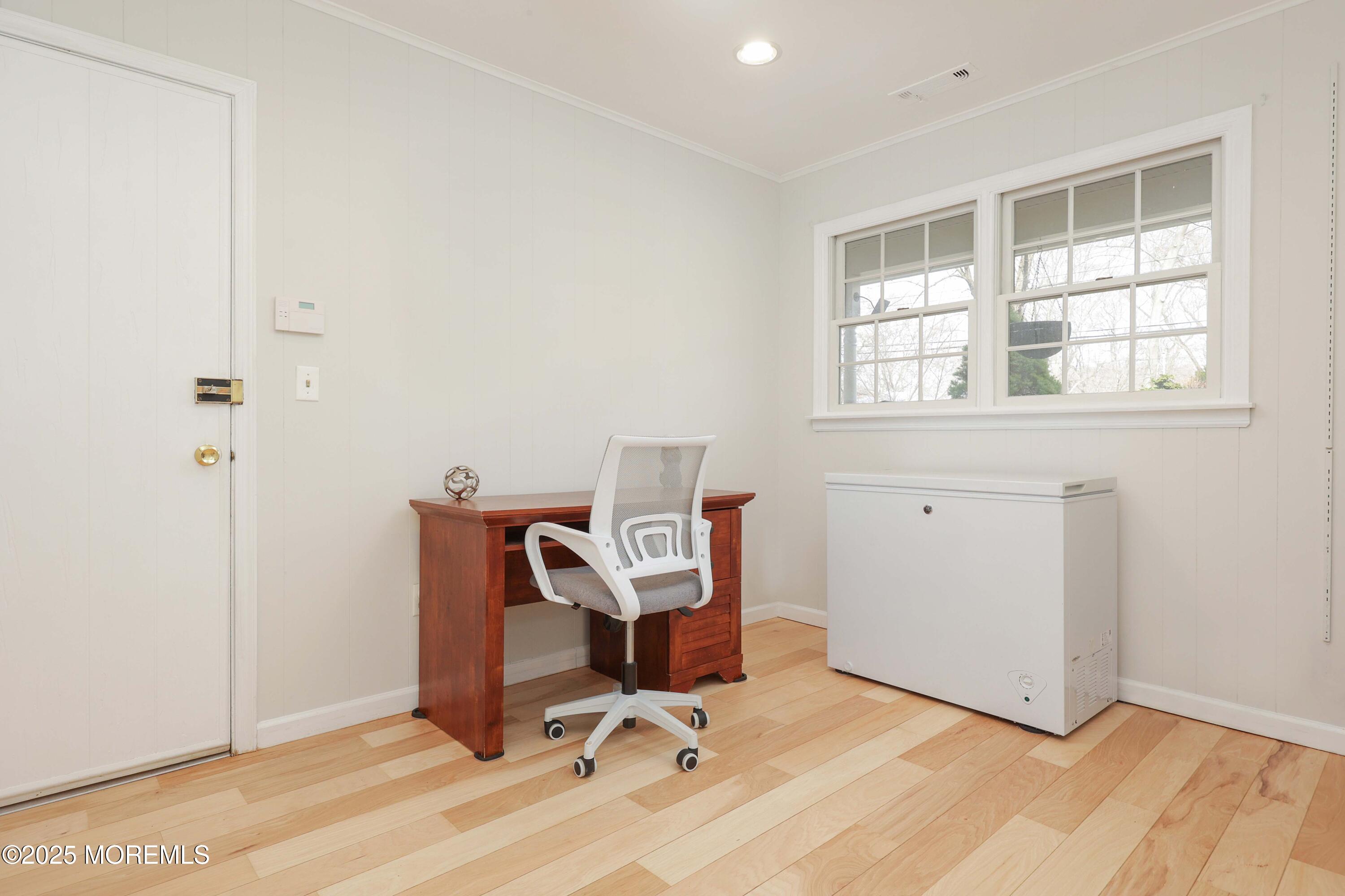 125 Jumping Brook Road Lincroft, NJ 07738 - Photo 27 of 47 a view of workspace with wooden floor windows
