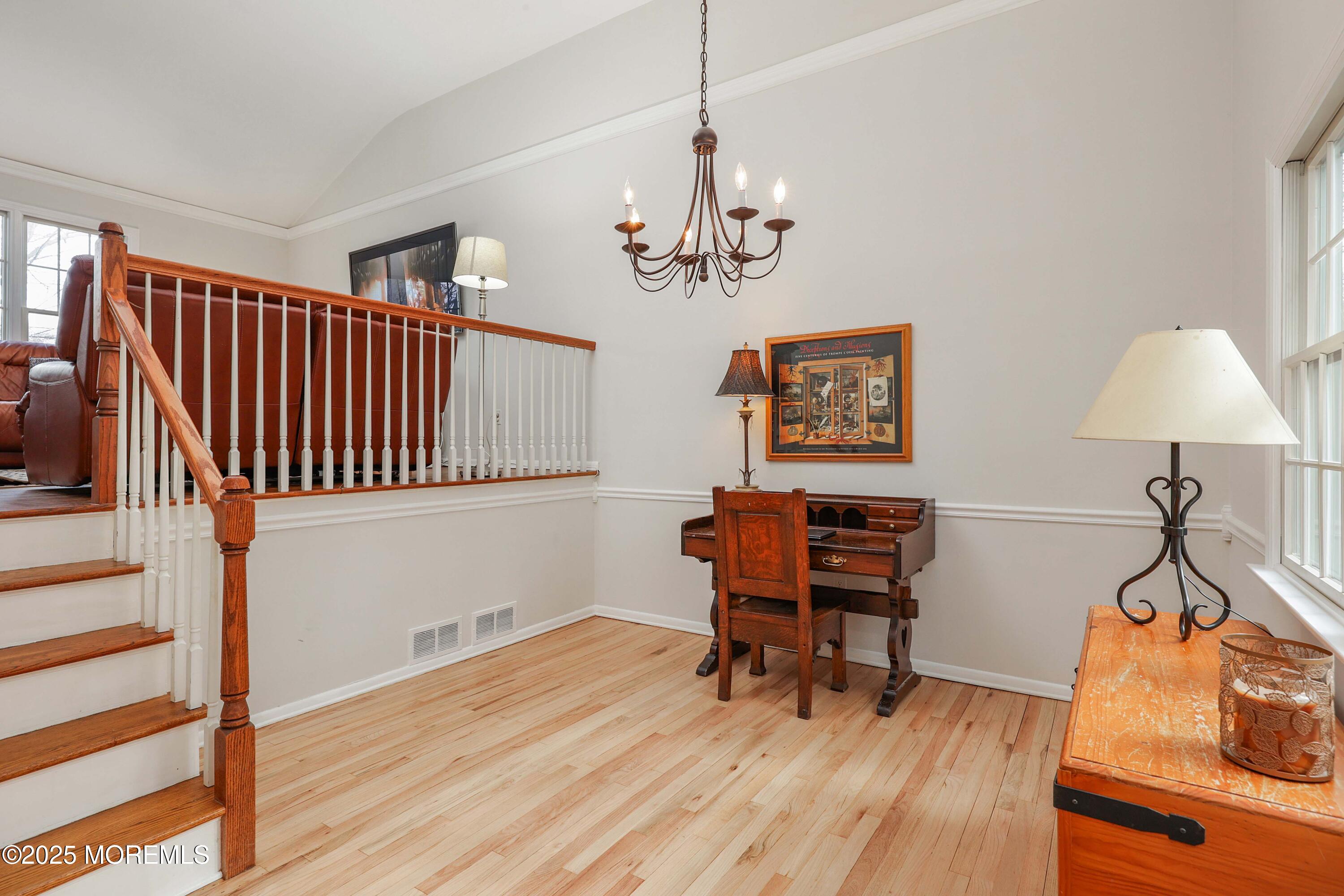 125 Jumping Brook Road Lincroft, NJ 07738 - Photo 35 of 47 a view of a workspace with furniture and wooden floor
