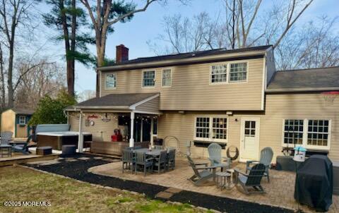 125 Jumping Brook Road Lincroft, NJ 07738 - Photo 7 of 47 a view of the house with patio