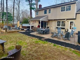 125 Jumping Brook Road Lincroft, NJ 07738 - Photo 8 of 47 a view of a house with swimming pool and sitting area