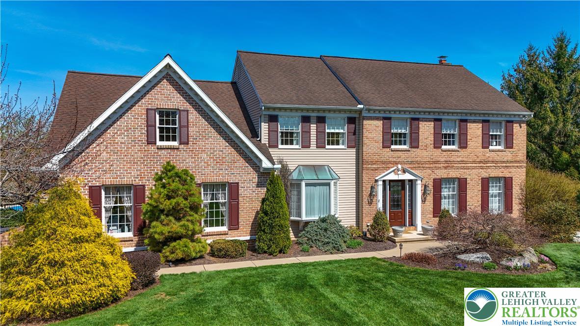 4059 Old Sentry Road Allentown, PA 18104 - Photo 37 of 39 A classic brick exterior with well-maintained landscaping and a welcoming entry defines this charming residence.