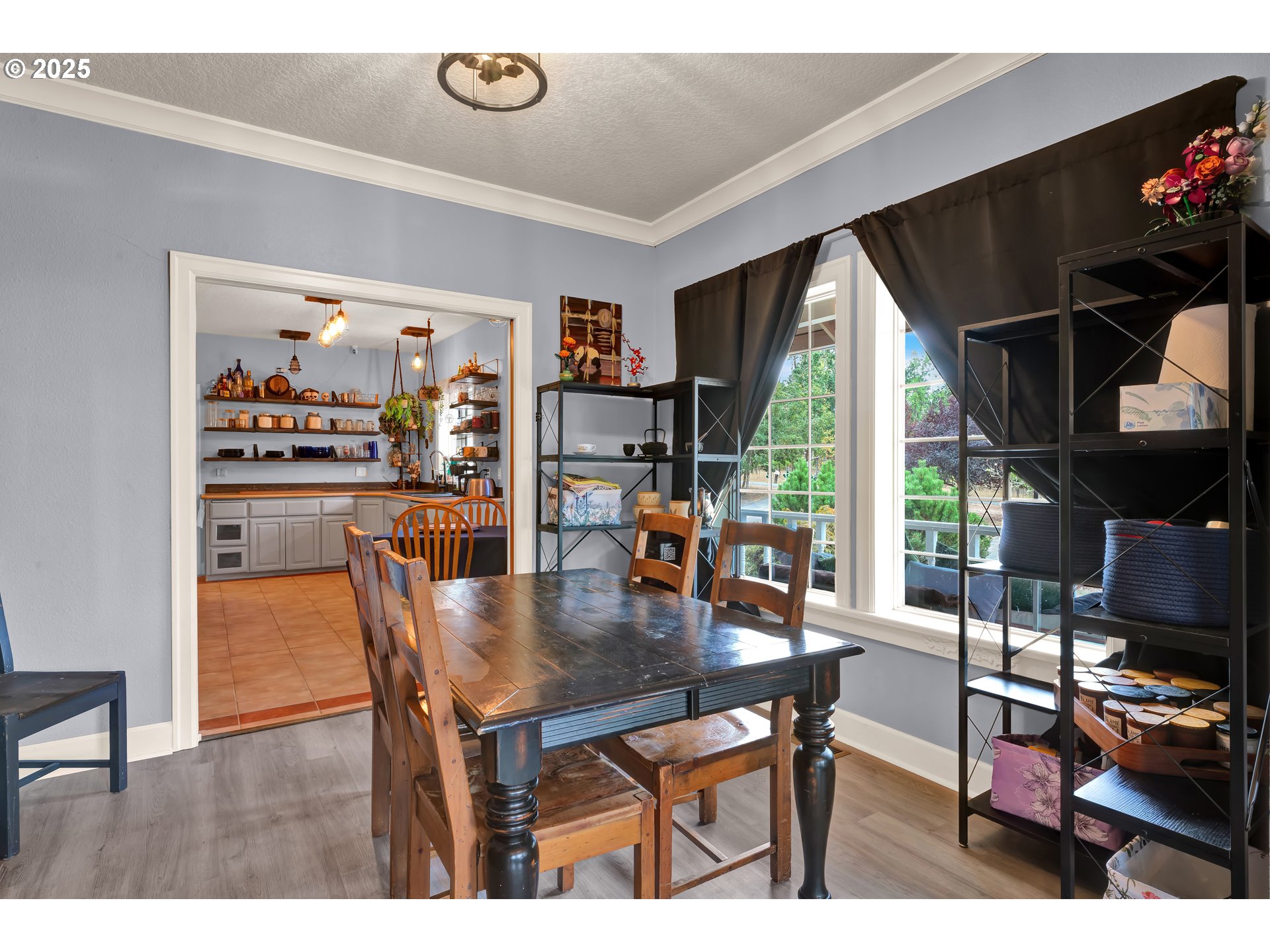 33530 Molitor Ranch Road Cottage Grove, OR 97424 - Photo 11 of 40 a dining room with furniture window and wooden floor