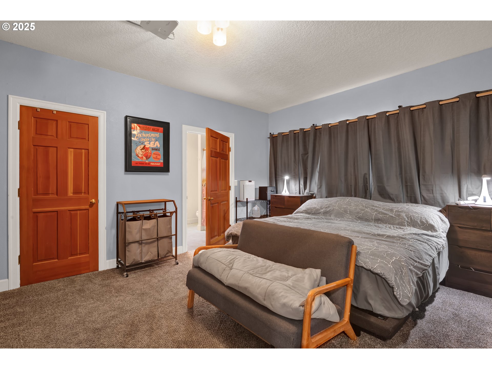 33530 Molitor Ranch Road Cottage Grove, OR 97424 - Photo 15 of 40 a bed room with a bed and a chair