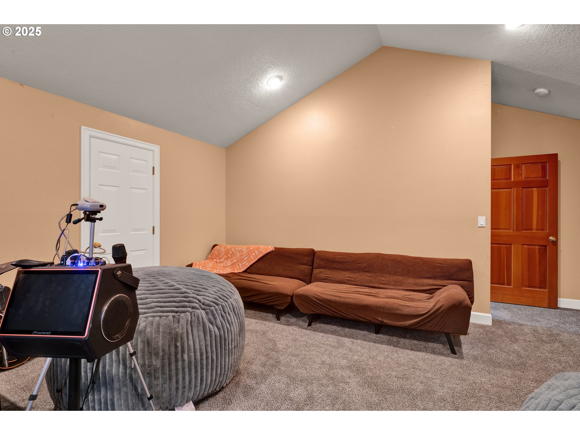 33530 Molitor Ranch Road Cottage Grove, OR 97424 - Photo 22 of 40 a bedroom with a bed and a chair