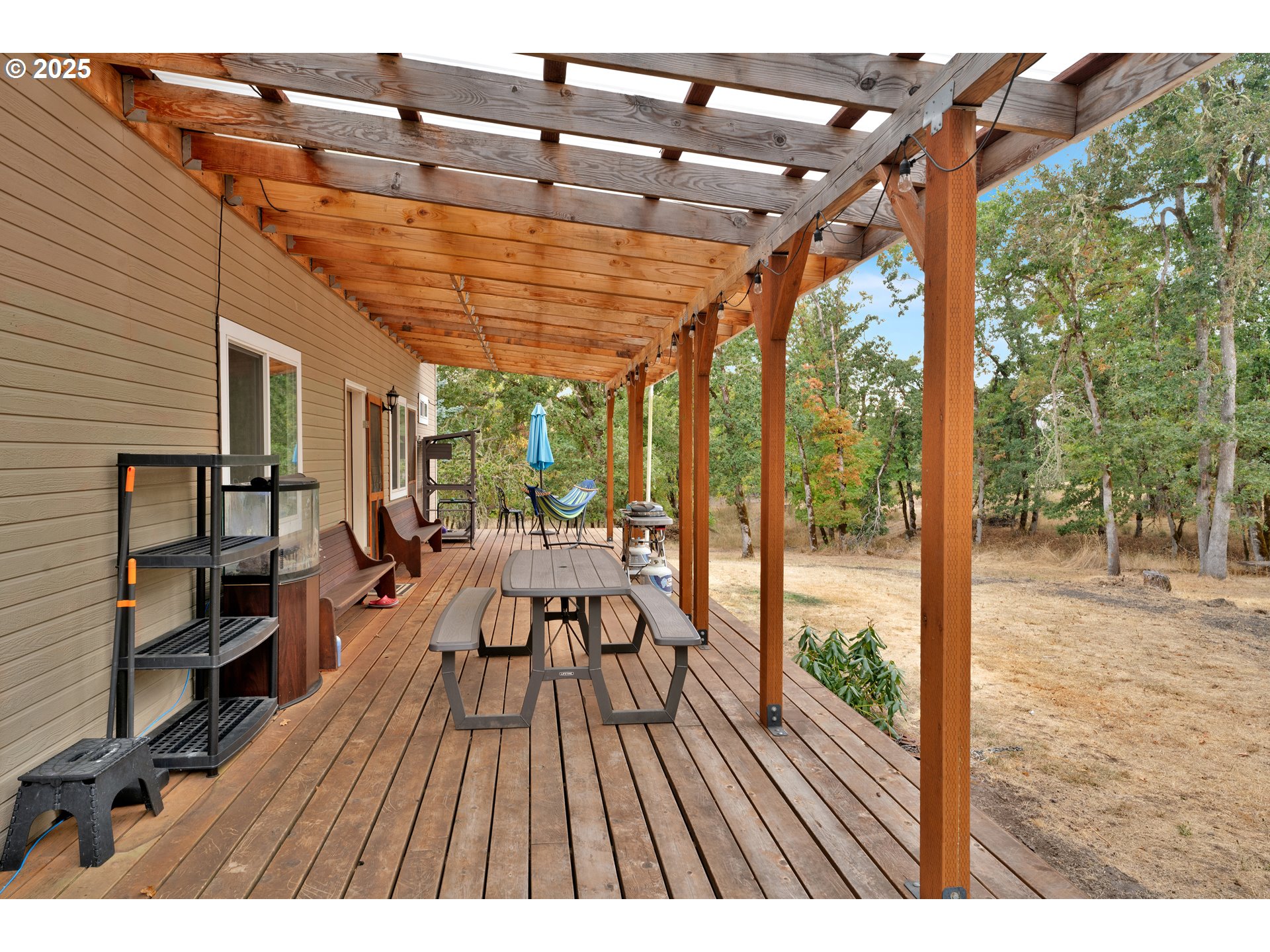 33530 Molitor Ranch Road Cottage Grove, OR 97424 - Photo 34 of 40 a view of living room with furniture and wooden floor