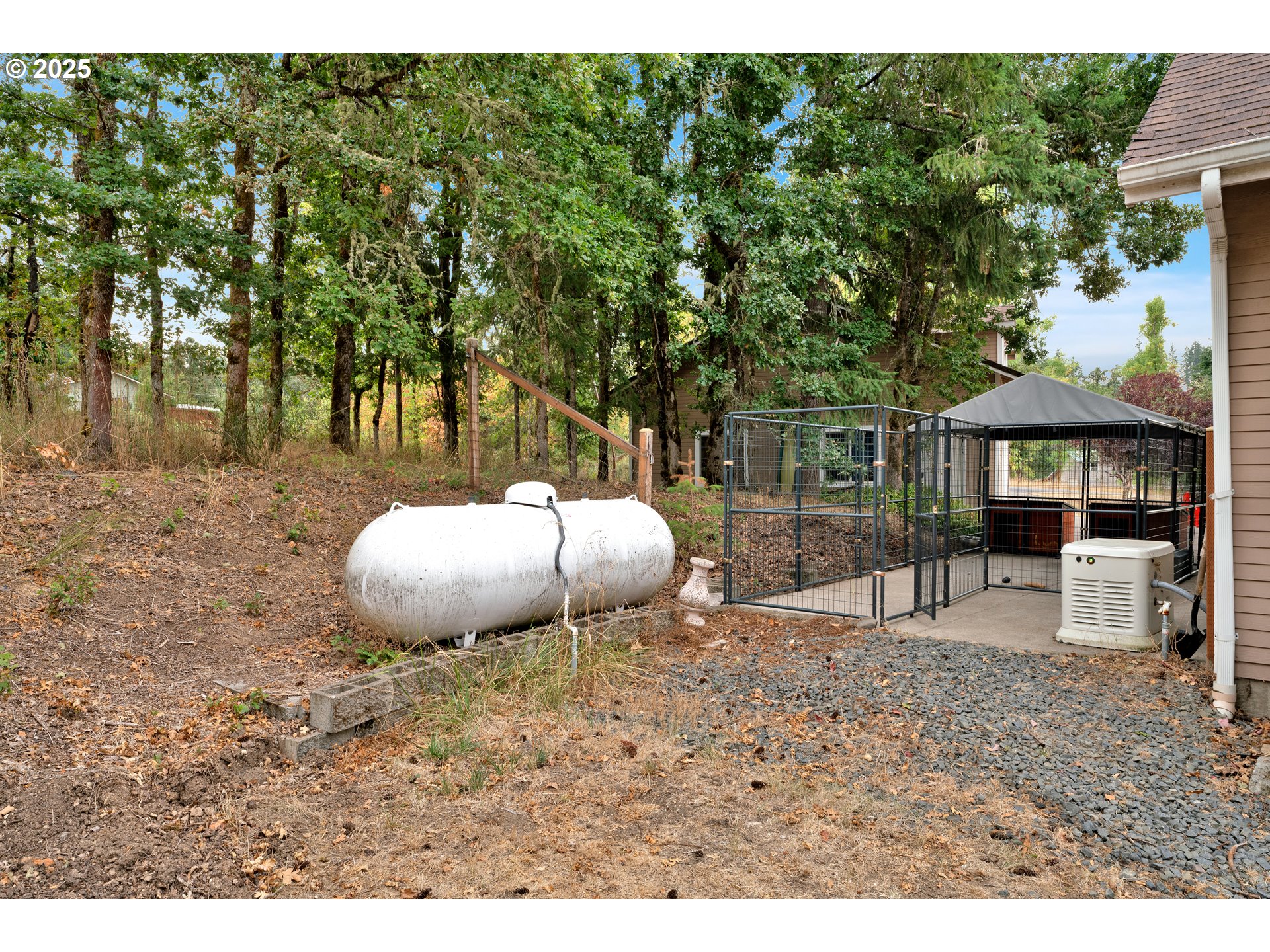 33530 Molitor Ranch Road Cottage Grove, OR 97424 - Photo 37 of 40 a view of a backyard with table and chairs