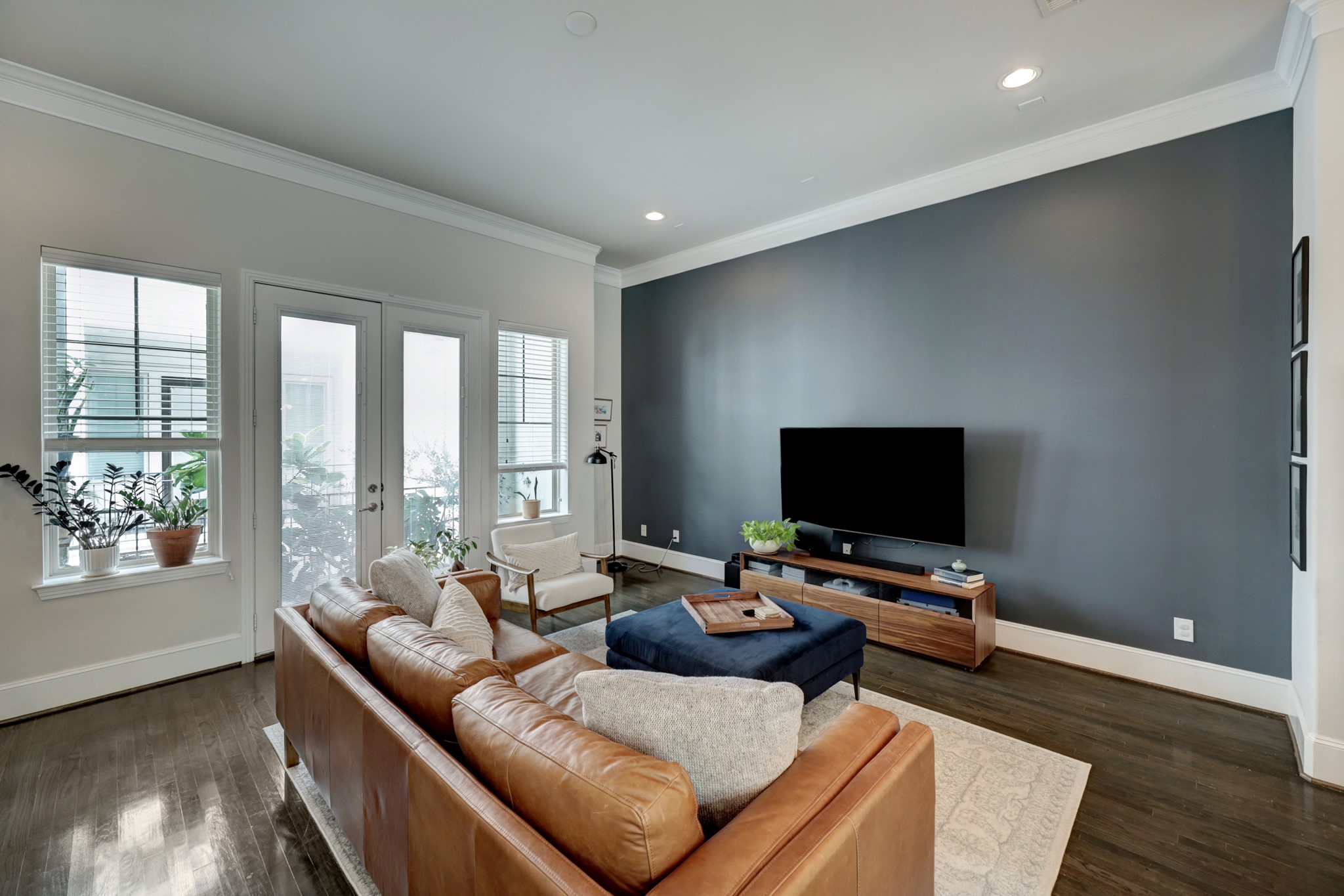 2231 Chenevert Street Houston, TX 77003 - Photo 13 of 26 a living room with furniture and a flat screen tv