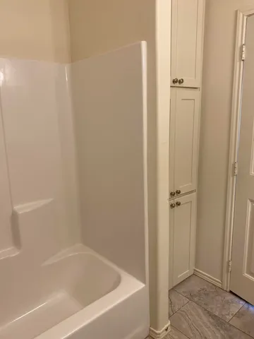 a bathroom with a bathtub