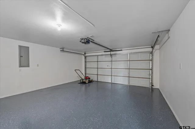 an empty room with a empty space and wooden floor