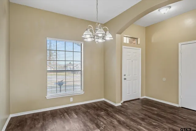 a view of an empty room with window