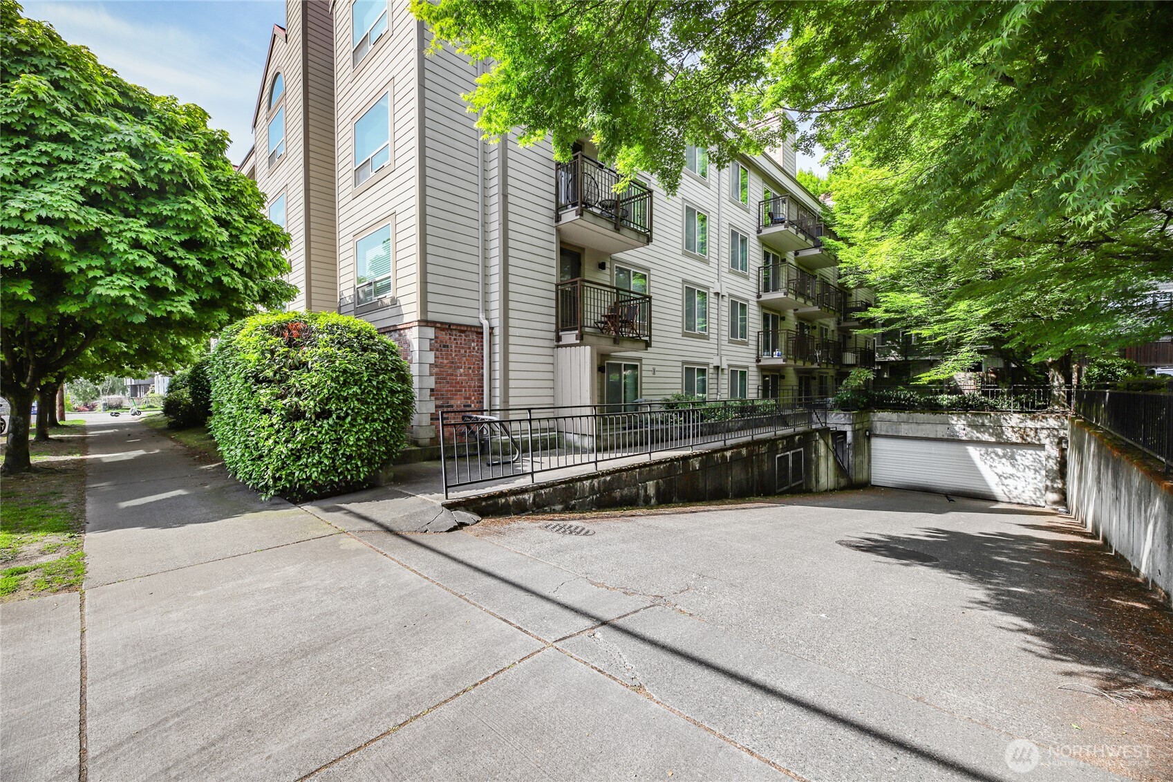 566 Prospect Street, Unit 209 Seattle, WA 98109 - Photo 15 of 16 a view of a building with large windows