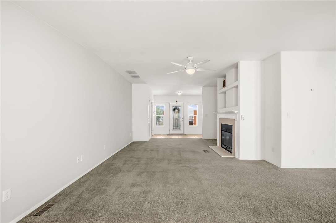 2525 South Ridge Avenue Bullhead City, AZ 86429 - Photo 19 of 76 Open living area with gray carpet flooring and neutral wall finishes