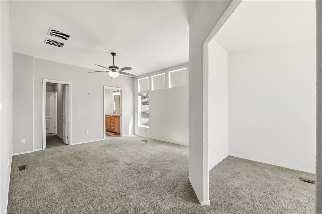 2525 South Ridge Avenue Bullhead City, AZ 86429 - Photo 46 of 76 Spacious room featuring vaulted ceilings