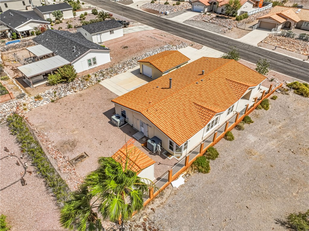 2525 South Ridge Avenue Bullhead City, AZ 86429 - Photo 73 of 76 Expansive property featuring a single-story residence with a terracotta-toned roof and a detached garage