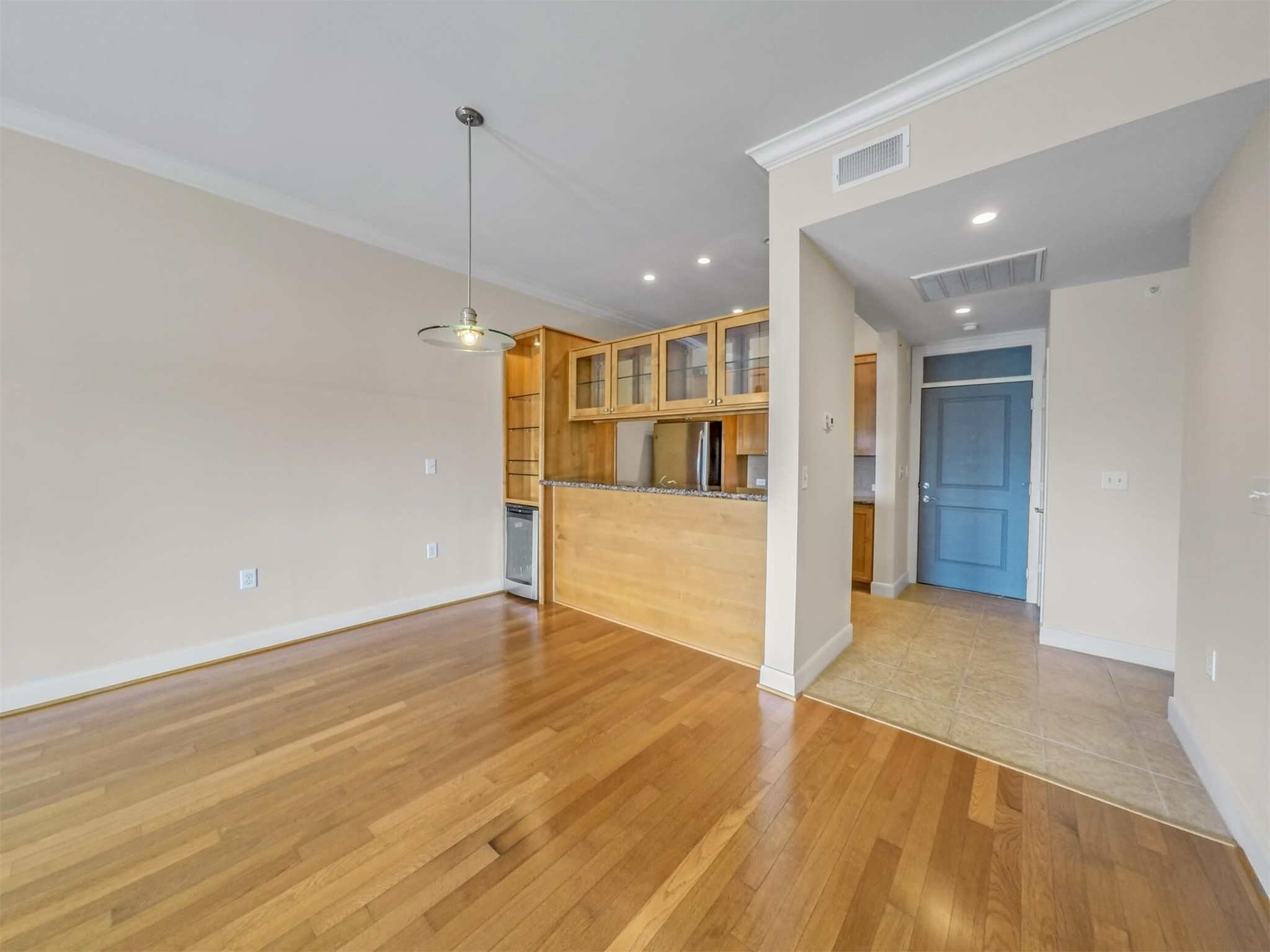 1010 Rosine Street, Unit 22 Houston, TX 77019 - Photo 11 of 21 a view of a kitchen with a wooden floor