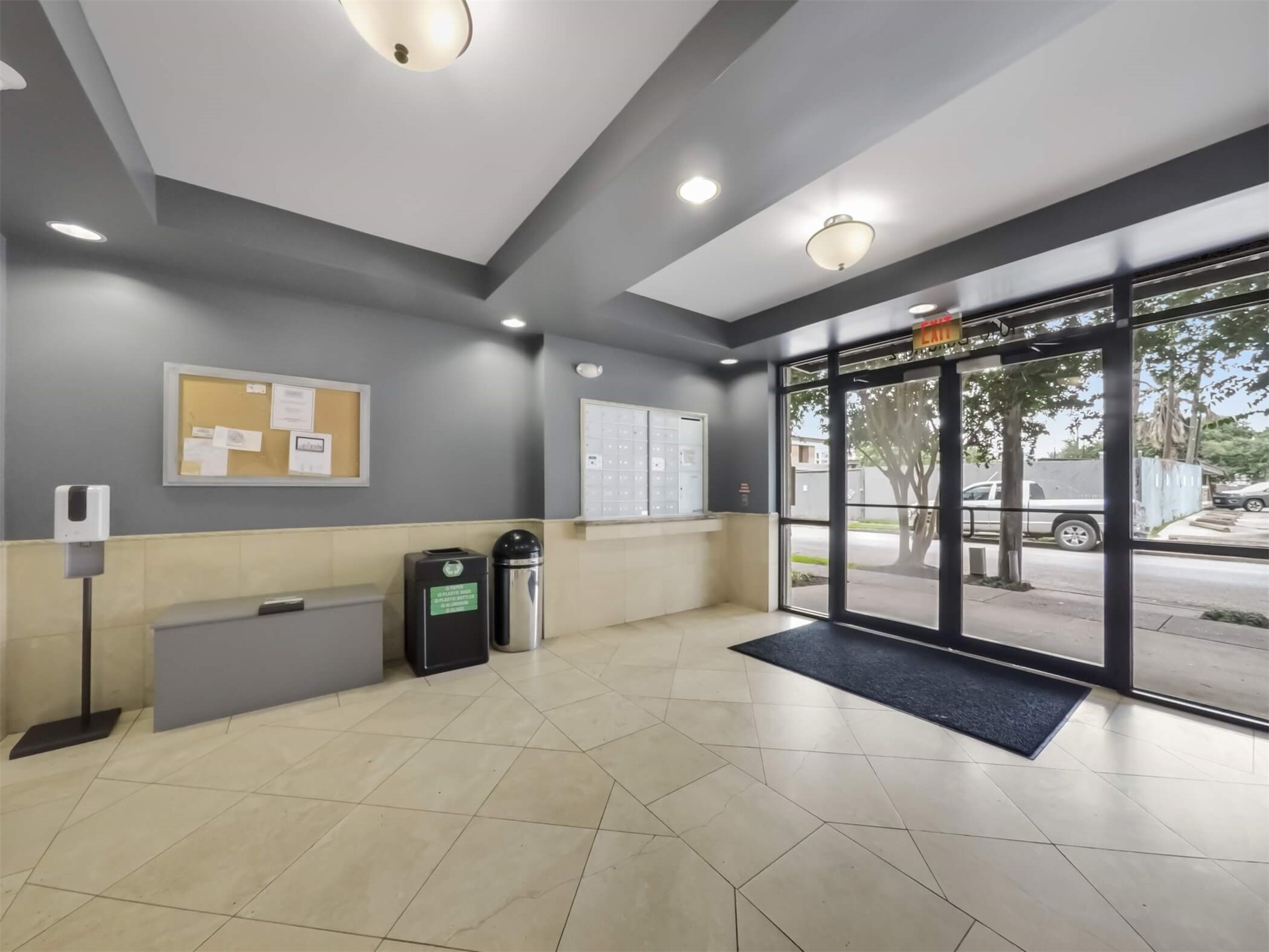 1010 Rosine Street, Unit 22 Houston, TX 77019 - Photo 2 of 21 a spacious bathroom with a large mirror vanity and a shower