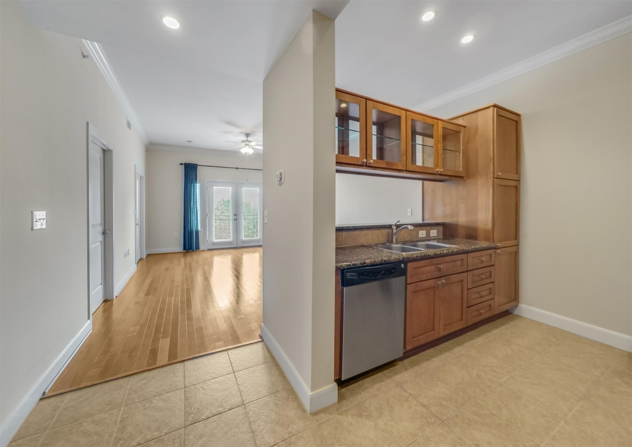 1010 Rosine Street, Unit 22 Houston, TX 77019 - Photo 5 of 21 a kitchen with stainless steel appliances granite countertop a stove and a refrigerator