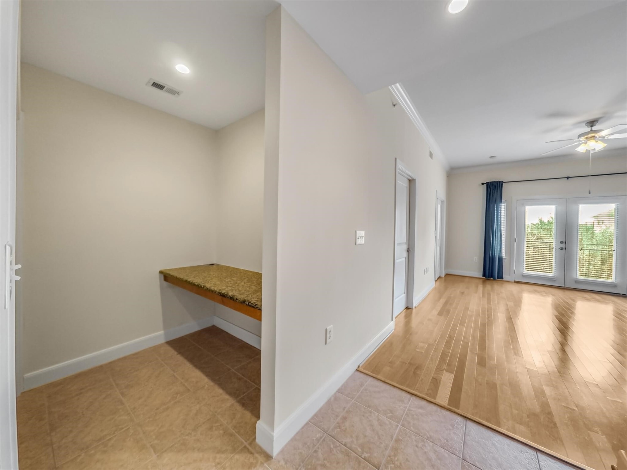 1010 Rosine Street, Unit 22 Houston, TX 77019 - Photo 8 of 21 wooden floor in an empty room with a window