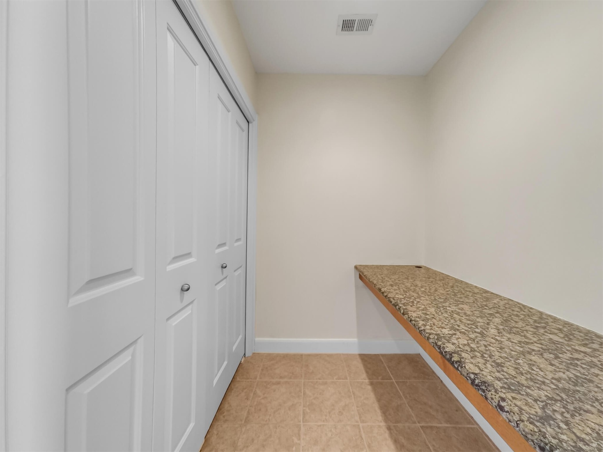 1010 Rosine Street, Unit 22 Houston, TX 77019 - Photo 9 of 21 a bathroom with a granite countertop sink and vanity