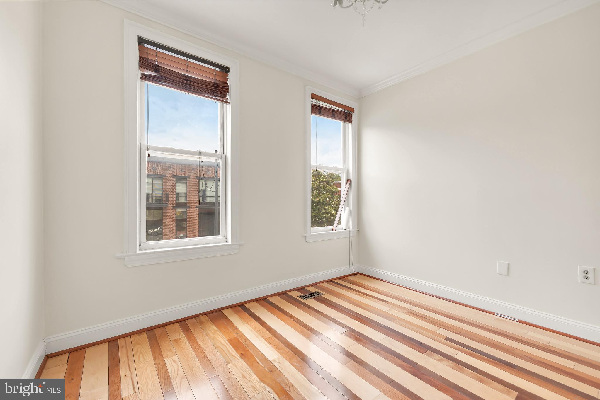730 15th Street Southeast, Unit 2 Washington, DC 20003 - Photo 9 of 16 an empty room with windows