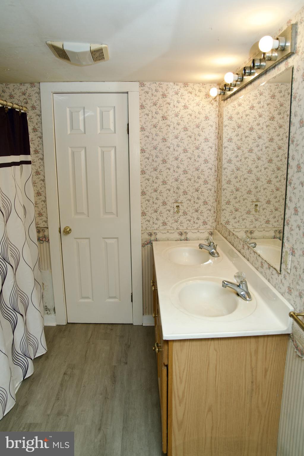 31867 Shavox Road Salisbury, MD 21804 - Photo 16 of 64 a bathroom with a sink and a shower