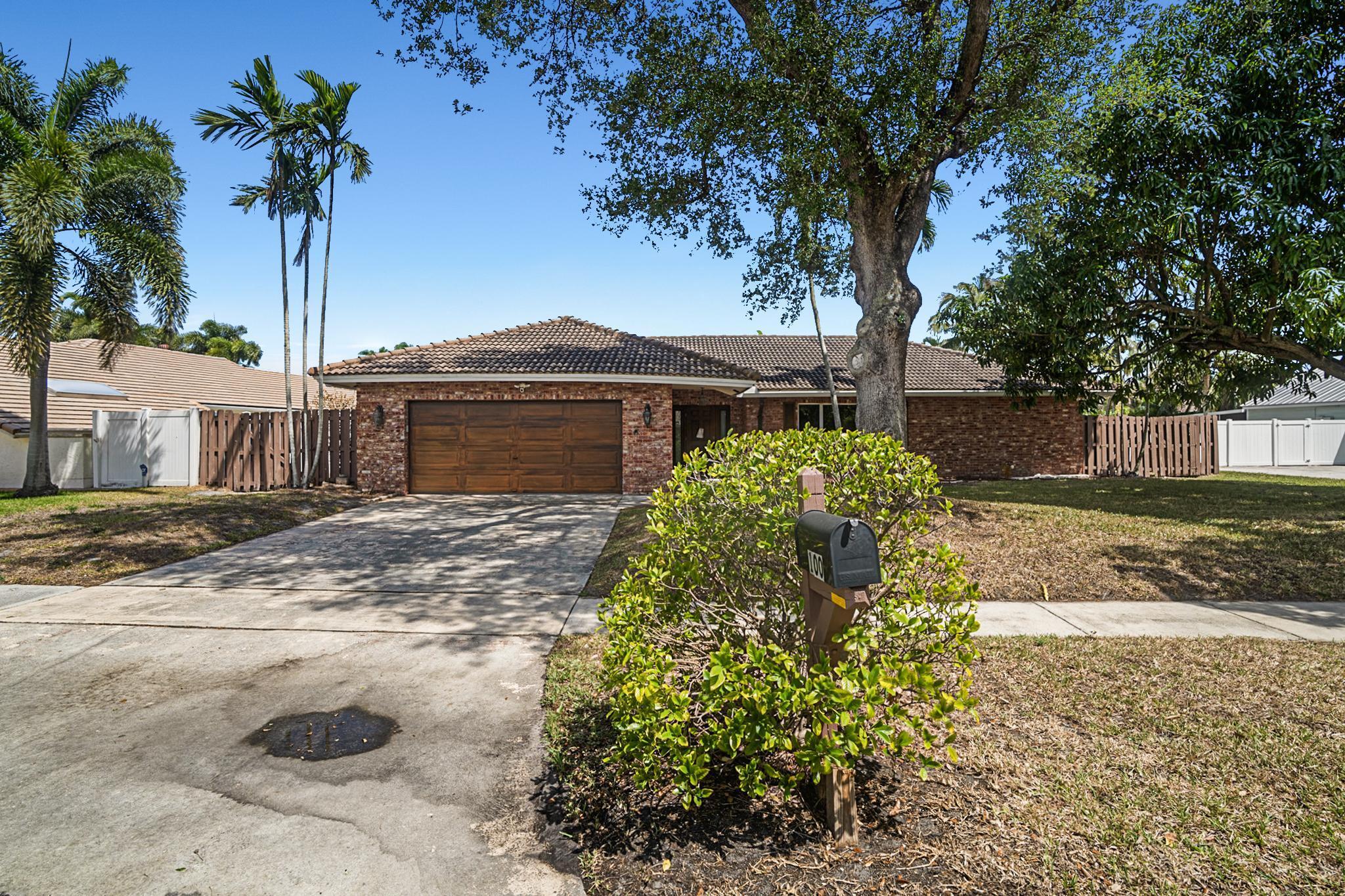 100 Southwest 15th Court Boca Raton, FL 33486 - Photo 1 of 43 Front