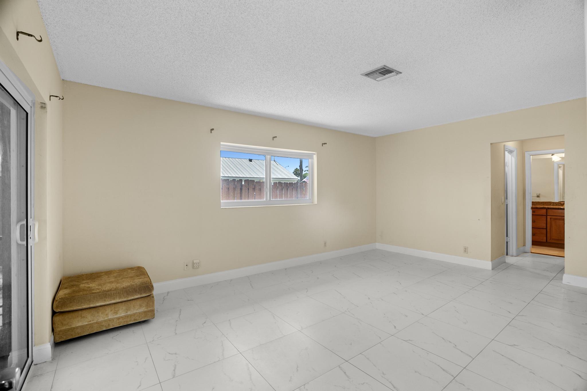 100 Southwest 15th Court Boca Raton, FL 33486 - Photo 25 of 43 Primary Bedroom