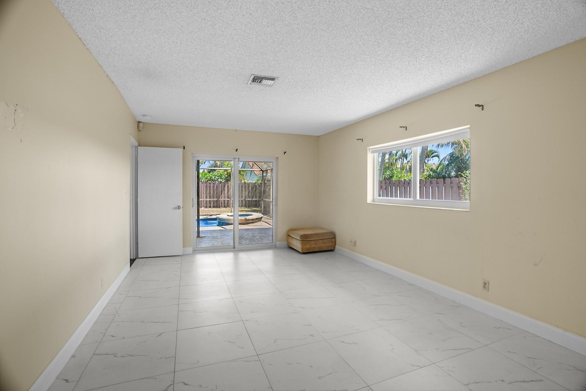 100 Southwest 15th Court Boca Raton, FL 33486 - Photo 26 of 43 Primary Bedroom