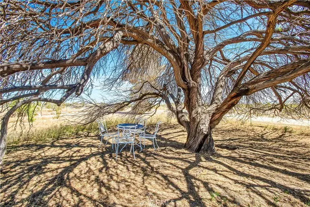 a view of a house with snow on the wall