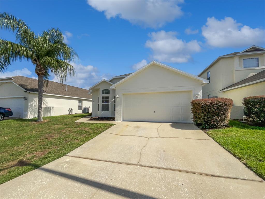 326 Fox Loop Davenport, FL 33837 - Photo 1 of 1 a bathroom with a sink and a yard