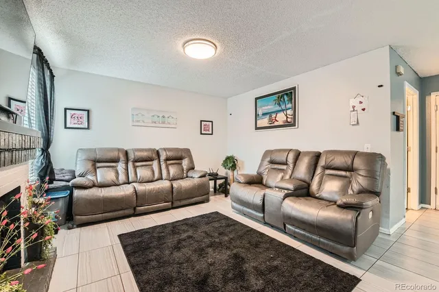 a living room with furniture and a couch