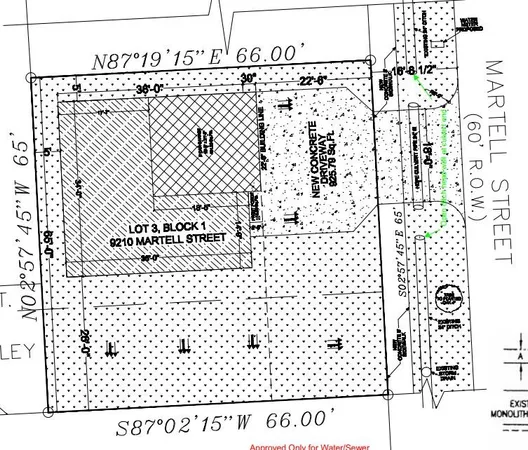 a view of kitchen with refrigerator and microwave