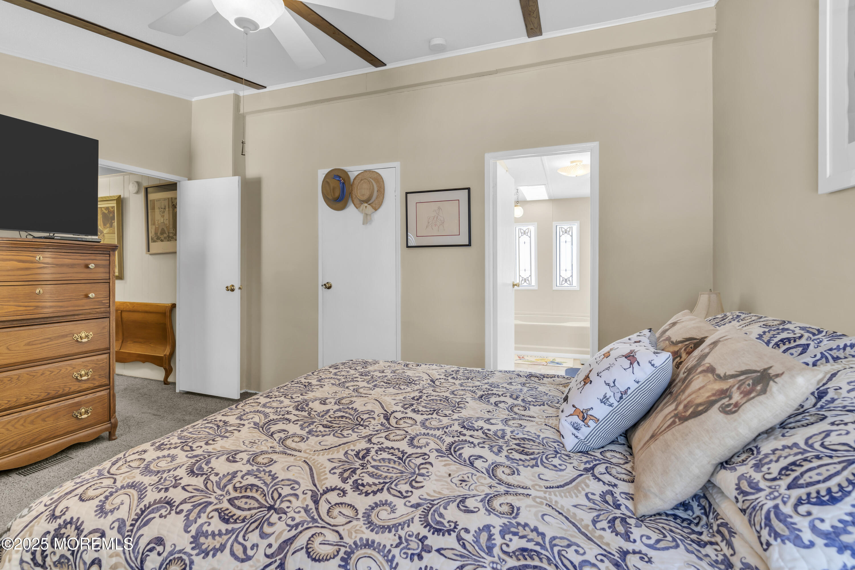 9 Greenway Trail Cream Ridge, NJ 08514 - Photo 11 of 19 a bedroom with a bed and a television