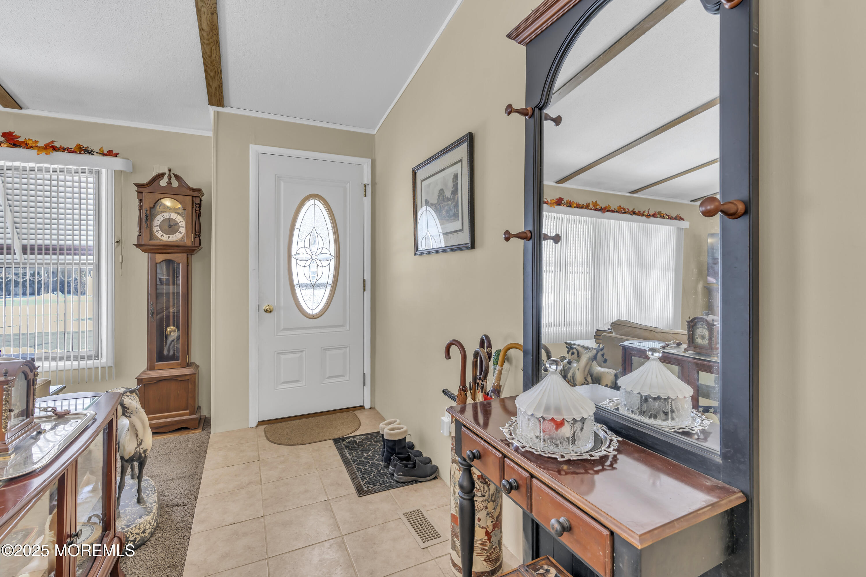 9 Greenway Trail Cream Ridge, NJ 08514 - Photo 4 of 19 a living room with furniture a rug and a window