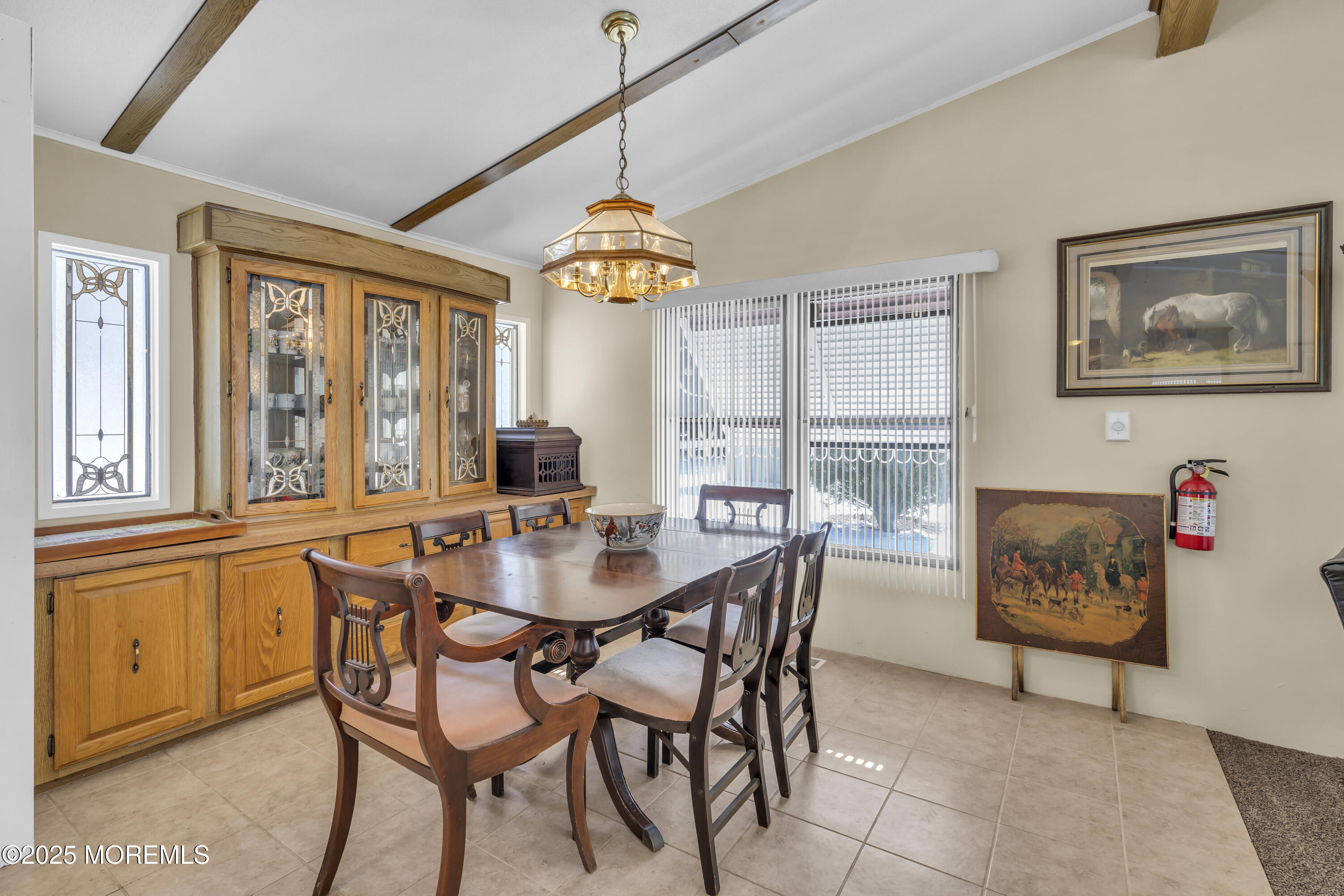 9 Greenway Trail Cream Ridge, NJ 08514 - Photo 9 of 19 a dining room with furniture a chandelier and window