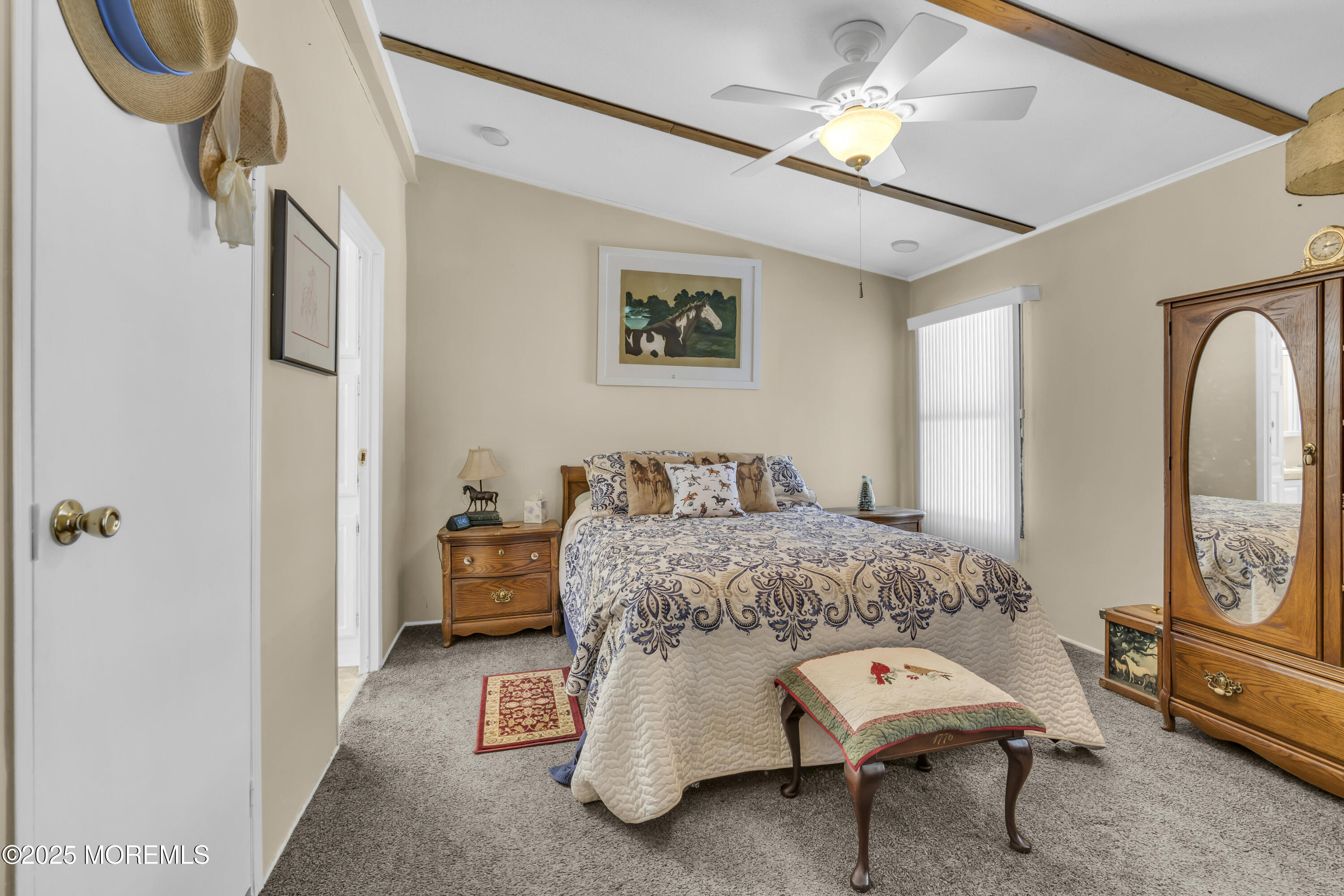 9 Greenway Trail Cream Ridge, NJ 08514 - Photo 10 of 19 a bedroom with a bed and a chandelier