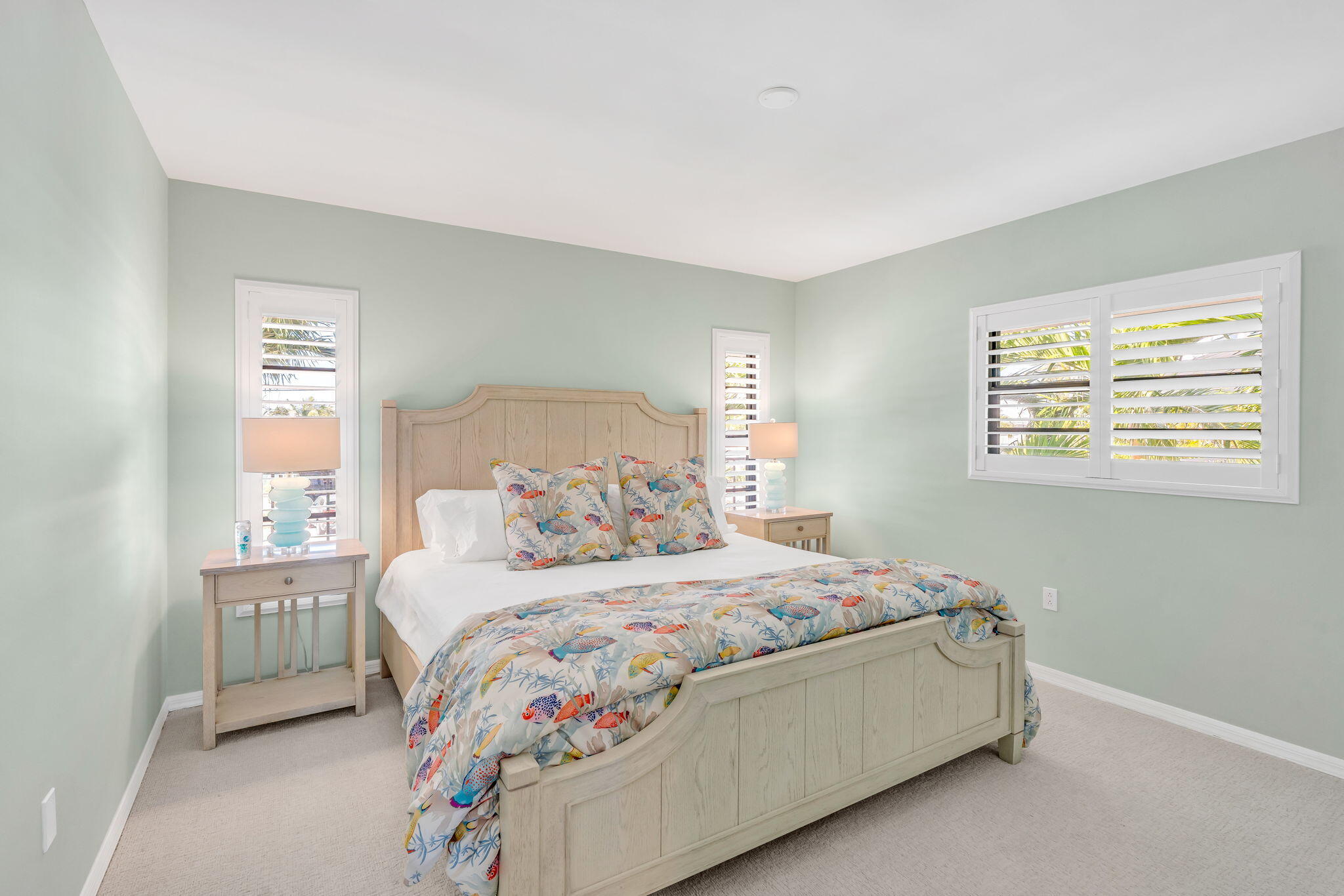 590 9th Street Key Colony Beach, FL 33051 - Photo 13 of 35 a bedroom with a bed and a window