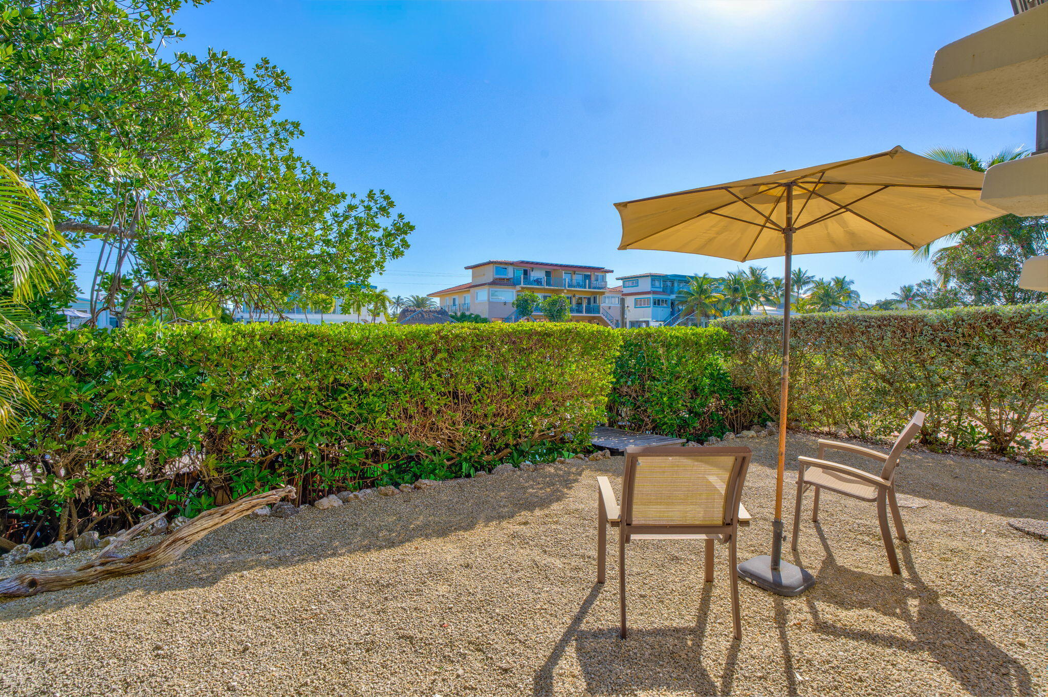 590 9th Street Key Colony Beach, FL 33051 - Photo 18 of 35 a view of a chair and table on the patio