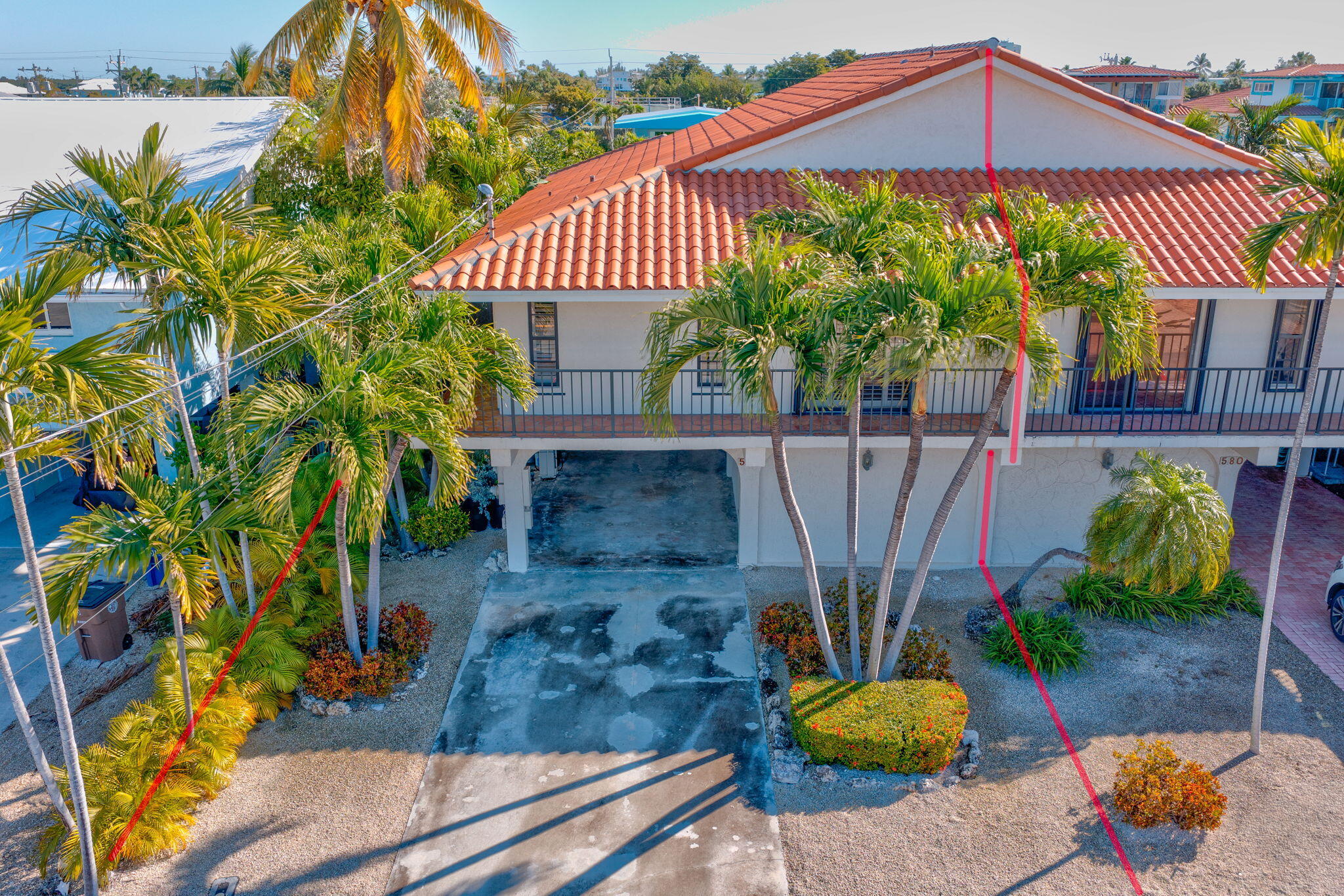 590 9th Street Key Colony Beach, FL 33051 - Photo 22 of 35 a front view of a house with a yard