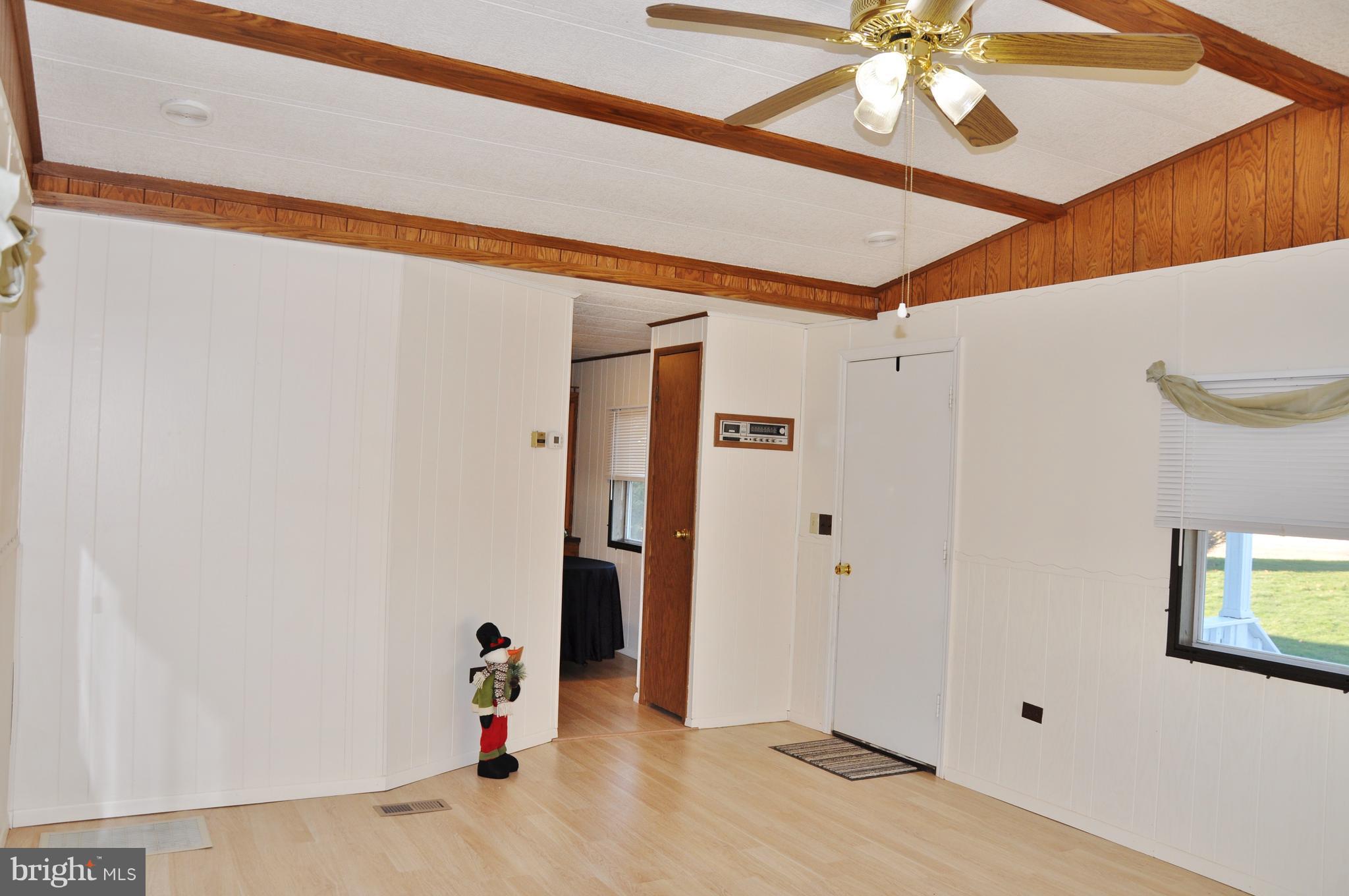 9294 Mead Hill Road Felton, PA 17322 - Photo 5 of 35 Bright and cheery living room with vaulted ceiling