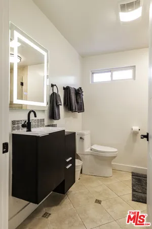 a bathroom with a sink and a toilet