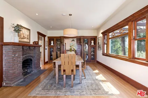 a view of a livingroom with furniture window and wooden floor