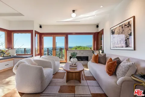a view of a balcony and mountain view