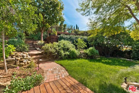 a view of a mini pool with an outdoor seating